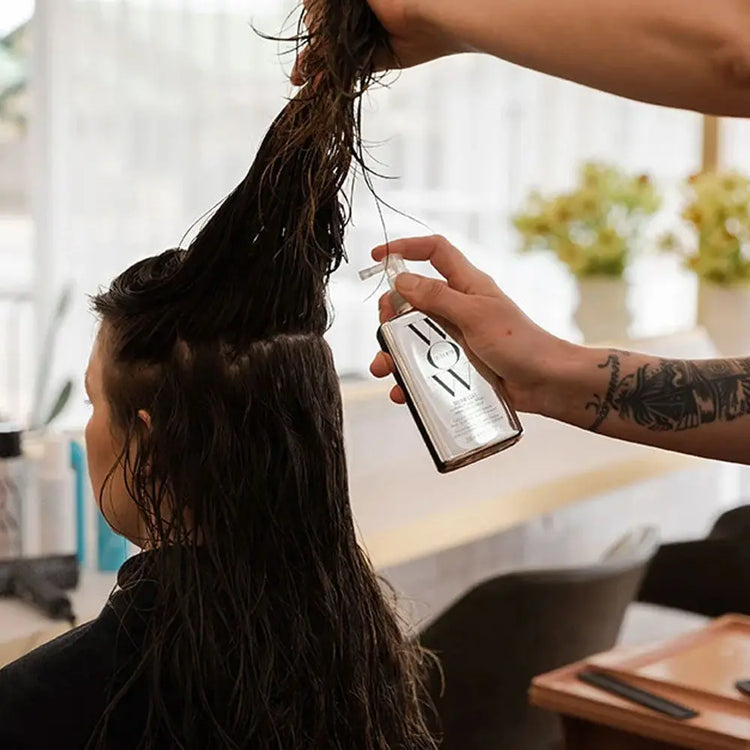 Inspired by new textile technology, ColorWow Dream Coat Anti-Humidity Treatment covers each hair strand with an invisible waterproofing cloak. A must for anyone looking to fight frizzy hair. Creates a shiny, glass-like finish on the hair. Forms a lightweight, waterproof coat on the hair. Speeds up blow-drying time. Buy today from The DO Salon - your hair health experts