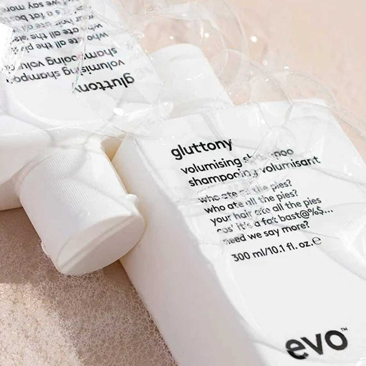 Evo Gluttony Volumising Shampoo 300ml – a lightweight, body-boosting shampoo for fine, flat hair. Gently cleanses, removes buildup, and enhances thickness & volume. Vegan & cruelty-free. Available online at The DO Salon. Shop now. Bubbles