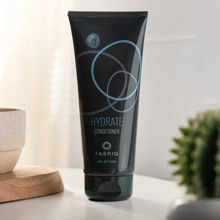 Fabriq Hydrate Conditioner: Intense hydration for dry, damaged hair. Lightweight formula with Hydrolyzed Vegetable Proteins & Botanicals for smooth, shiny results. Shop at The DO Salon, St Kilda. lifestyle