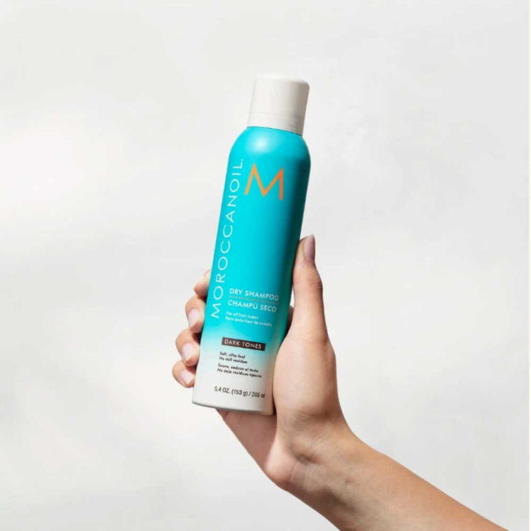 Moroccanoil Dry Shampoo Dark Tones 205ml is now available in a bonus travel size. It is oil-absorbing, non-dulling, and argan oil-infused, perfect for brunettes. Shop online now at The DO Salon. 2