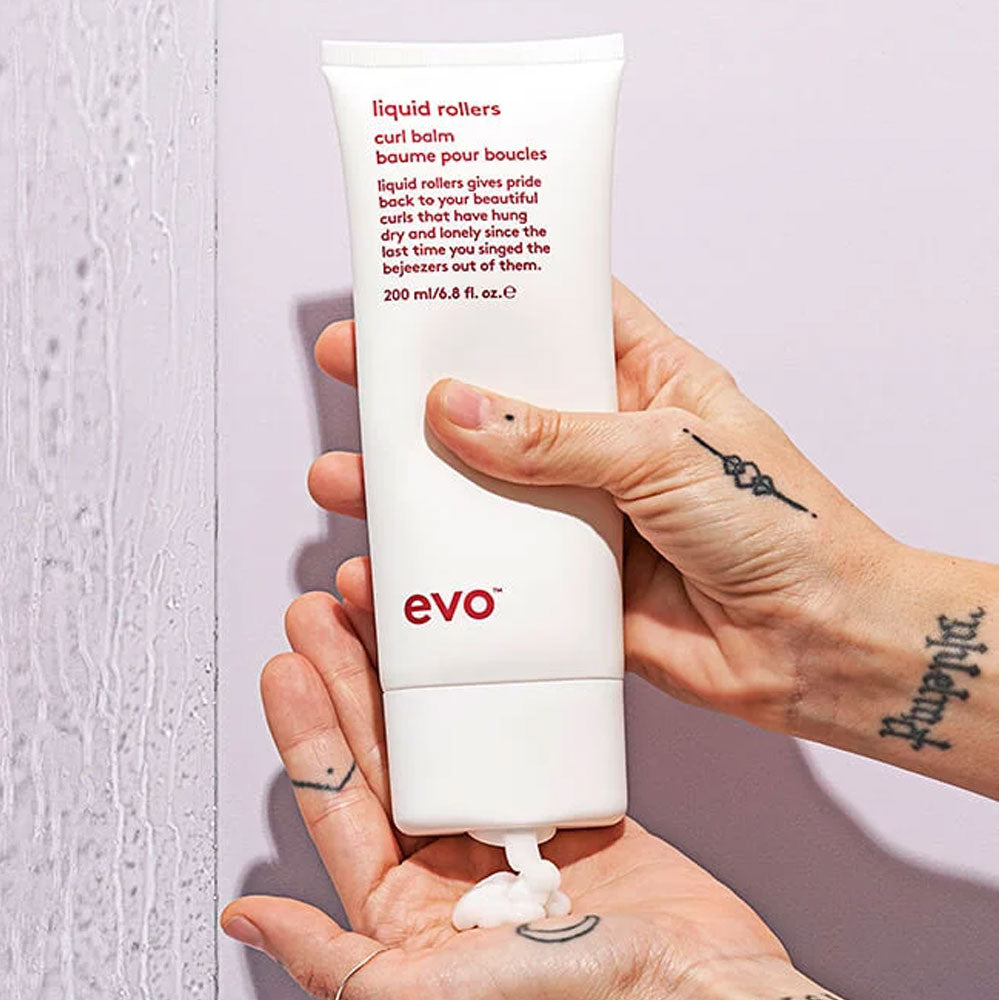 Say goodbye to crunchy, frizzy hair and hello to beautifully defined, soft, and hydrated locks with EVO Liquid Rollers Curl Balm at The DO Salon! Enhances and defines your natural curls while providing essential moisture and frizz control. Get all your EVO haircare styling products at The DO Salon St Kilda today. In use