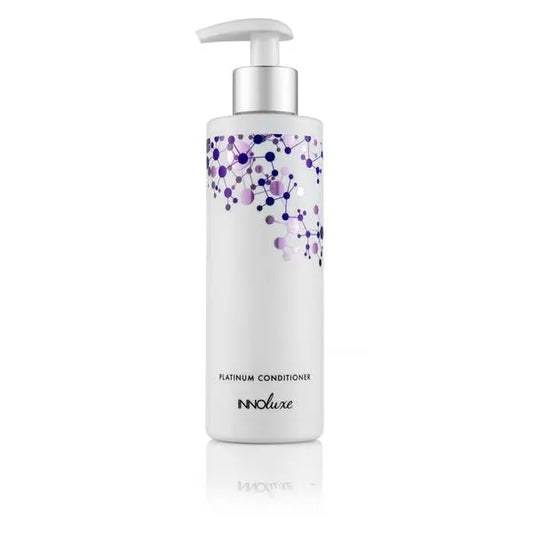 Shop INNOluxe Platinum Conditioner at The DO Salon in St Kilda, Melbourne. This lightweight violet conditioner neutralizes brassy tones, hydrates, and adds shine for cooler blonde results. Perfect for natural and coloured blonde hair. Buy now for silky, frizz-free hair! Buy today online or in-salon. 500ml