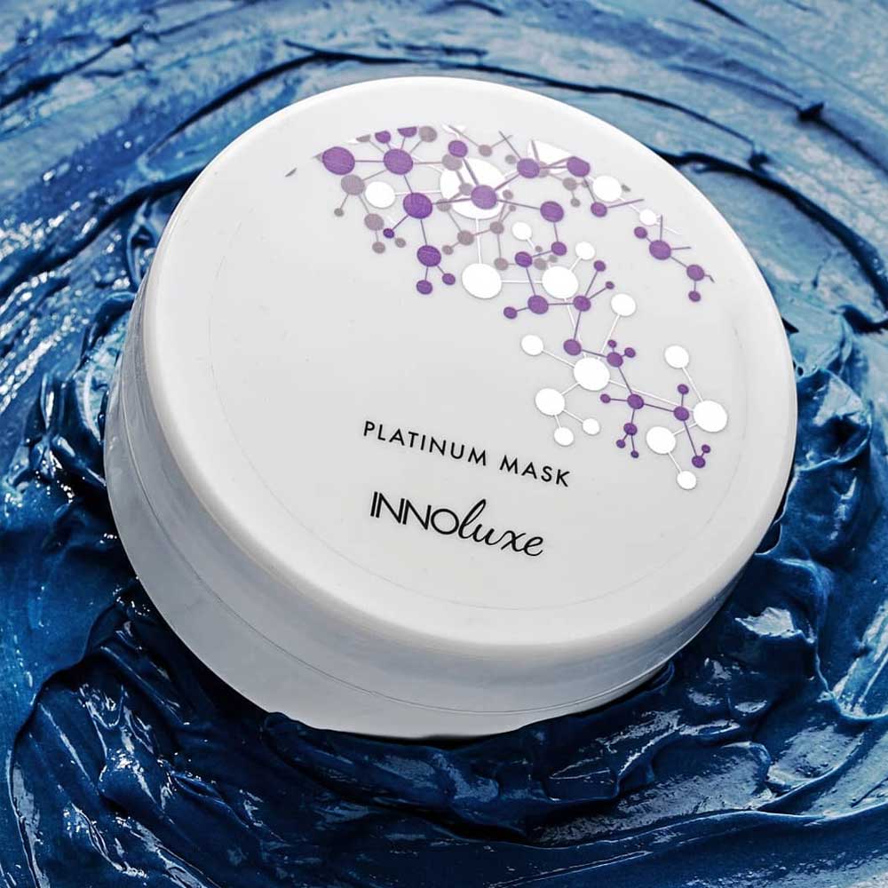 Indulge your hair with INNOluxe Platinum Deep Blue Hair Treatment Mask at The DO Salon. Deeply nourishes, repairs, and enhances your hair, leaving it soft, vibrant, & full of life. Experience the ultimate hair revival and embrace the brilliance of INNOluxe. Shop now for salon-quality results that will make heads turn!