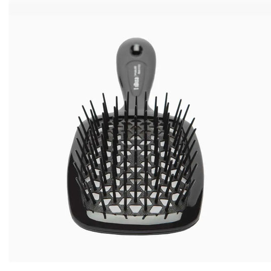 Revitalise your hair ritual with the Ibiza AirWave Shower Brush. Crafted in Italy, this versatile brush offers a scalp-friendly, tingly sensation, effortlessly gliding through any hair. Buy your AirWave Shower Brush at The DO Salon, St Kilda for an elevated haircare experience. Black Front