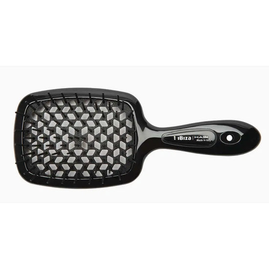 Revitalise your hair ritual with the Ibiza AirWave Shower Brush. Crafted in Italy, this versatile brush offers a scalp-friendly, tingly sensation, effortlessly gliding through any hair. Buy your AirWave Shower Brush at The DO Salon, St Kilda for an elevated haircare experience. Black