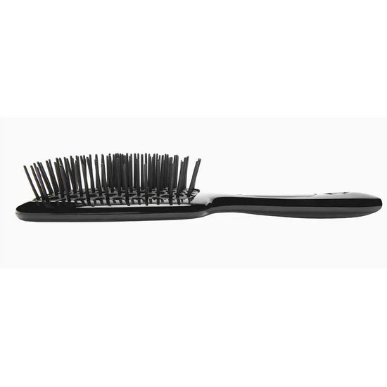 Revitalise your hair ritual with the Ibiza AirWave Shower Brush. Crafted in Italy, this versatile brush offers a scalp-friendly, tingly sensation, effortlessly gliding through any hair. Buy your AirWave Shower Brush at The DO Salon, St Kilda for an elevated haircare experience. SideBlack