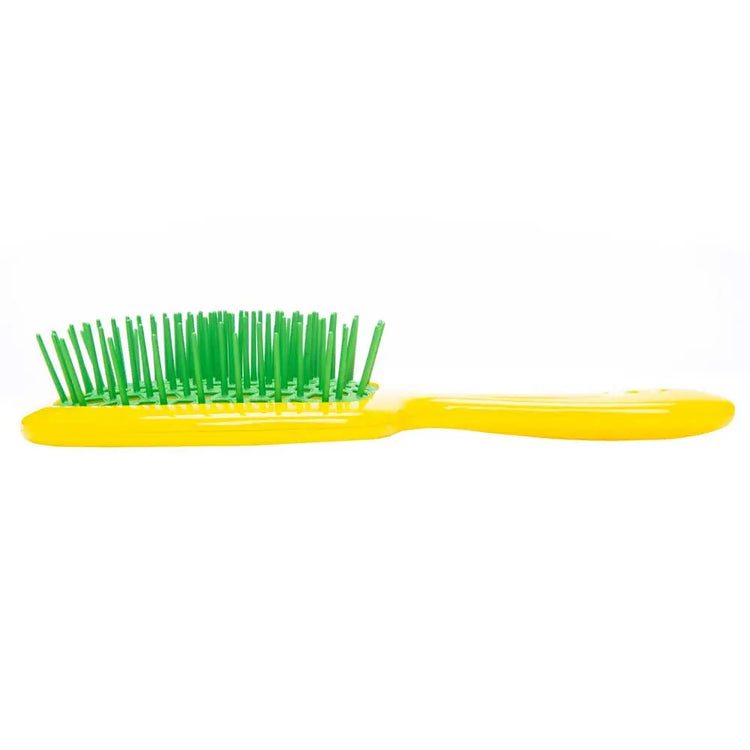 Revitalise your hair ritual with the Ibiza AirWave Shower Brush. Crafted in Italy, this versatile brush offers a scalp-friendly, tingly sensation, effortlessly gliding through any hair. Buy your AirWave Shower Brush at The DO Salon, St Kilda for an elevated haircare experience. Yellow Green Side