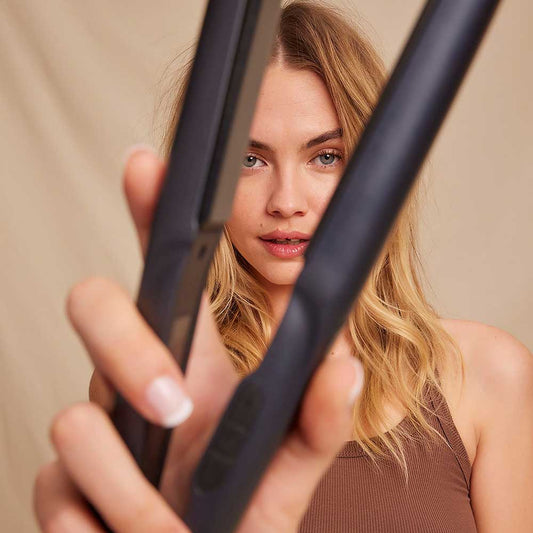 Discover versatility with the Kaleo Professional Iron at The DO Salon. Effortlessly curl, straighten, and smooth your hair with precision. Elevate your styling routine with this professional-grade tool for all hair types. (lifestyle)