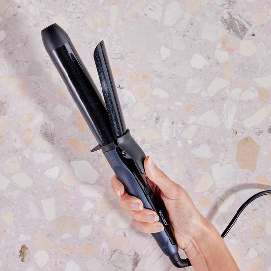 Elevate styling with Kaleo Curling Tong: bouncy curls, sleek waves, ceramic barrel, digital display, variable temperature. Versatile design caters to all hair types. Eco-friendly for healthier hair & planet. Discover Australia's best curling tong at The DO Salon, St Kilda, Melbourne. Buy today! 