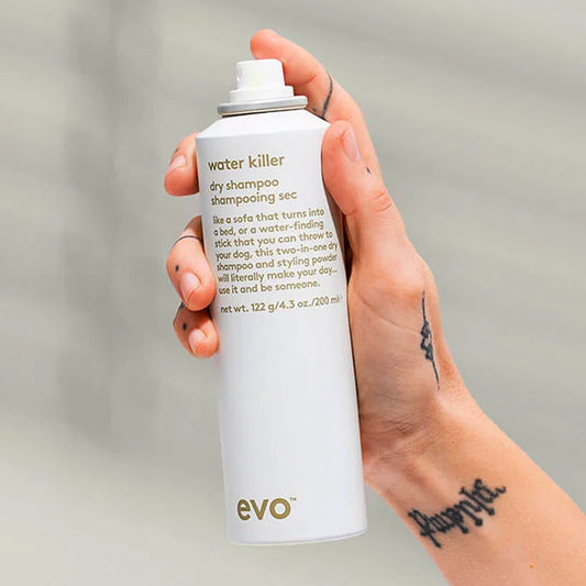 Discover the magic of Evo Water Killer Dry Shampoo at The DO Salon. Suitable for all hair types, this two-in-one solution absorbs excess oil, adds volume, and enhances texture. Enjoy touchable, refreshed hair with a captivating fragrance. Shop now for revived locks! Buy online or at our salon in St Kilda today.  with hand