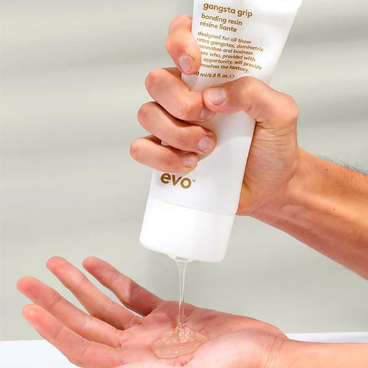 Unlock ultimate style control with Evo Gangsta Grip Bonding Resin. This extra-strong hold gel provides structured looks, high shine, and easy reactivation with water. Elevate your styling game—shop online at The DO Salon for a flawless finish! 2