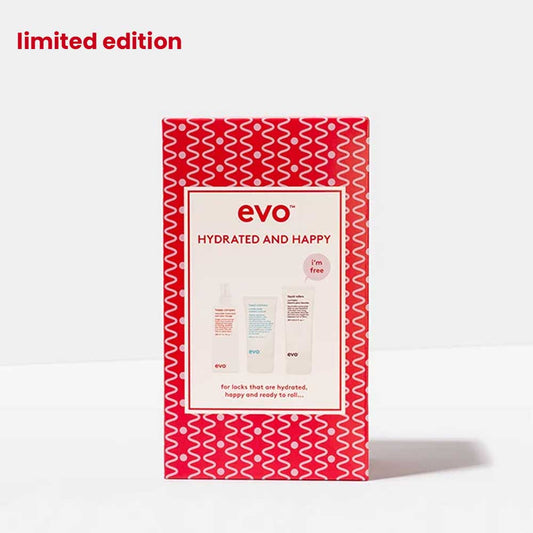 Hydrate and style your hair with EVO Hydrated and Happy Box Set. Includes Happy Campers Wearable Treatment, Head Mistress Cuticle Sealer & FREE Liquid Rollers Curl Balm. Available at The DO Salon in St Kilda, Melbourne. Shop now! Box