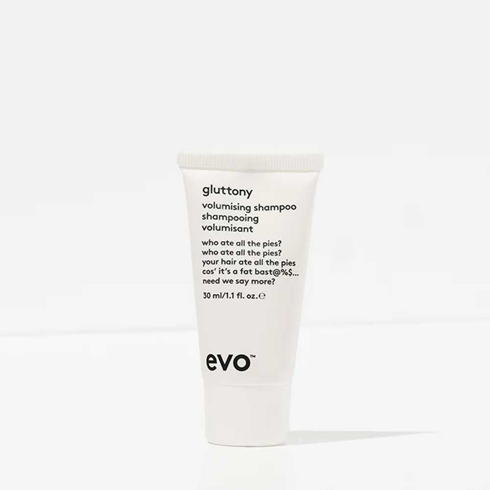 Boost fine hair with EVO Volume Introduction Bag. Includes Gluttony Shampoo, Bride of Gluttony Conditioner, Shape Vixen Lotion, and Root Canal Spray in travel sizes. Perfect for adding volume and body. Available at The DO Salon in St Kilda, Melbourne. Shop now! Evo Gluttony