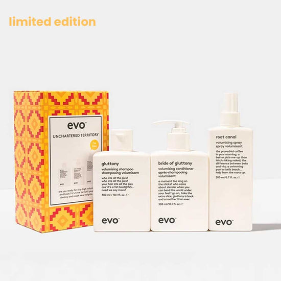 Boost fine, limp hair with the EVO Unchartered Territory Box Set. Includes Gluttony Shampoo, Bride of Gluttony Conditioner, and FREE Root Canal Volumising Spray. Perfect for colour-treated hair. Available at The DO Salon in St Kilda, Melbourne. Shop now!