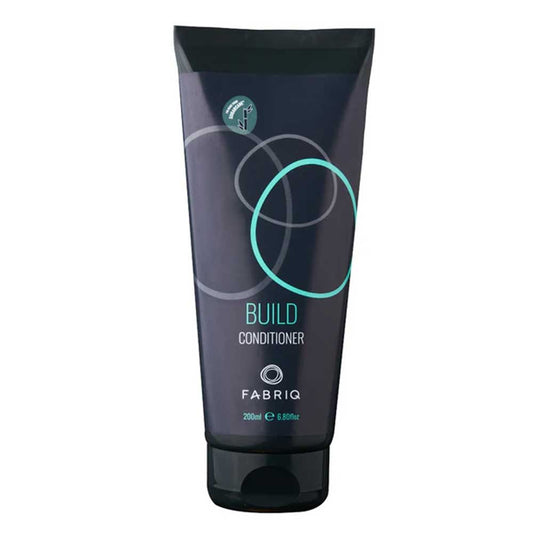 Strengthen and hydrate fine, limp hair with Fabriq Build Conditioner 200ml. Lightweight formula with natural extracts for soft, shiny, and tangle-free hair. Available at The DO Salon, St Kilda.