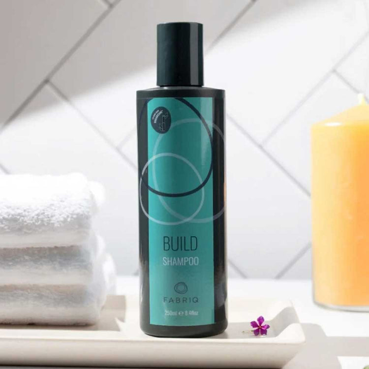 Strengthen and cleanse hair with Fabriq Build Shampoo. Perfect for chemically treated or fragile hair, Build Shampoo formula boosts resilience and shine. Shop now at The DO Salon in St Kilda!