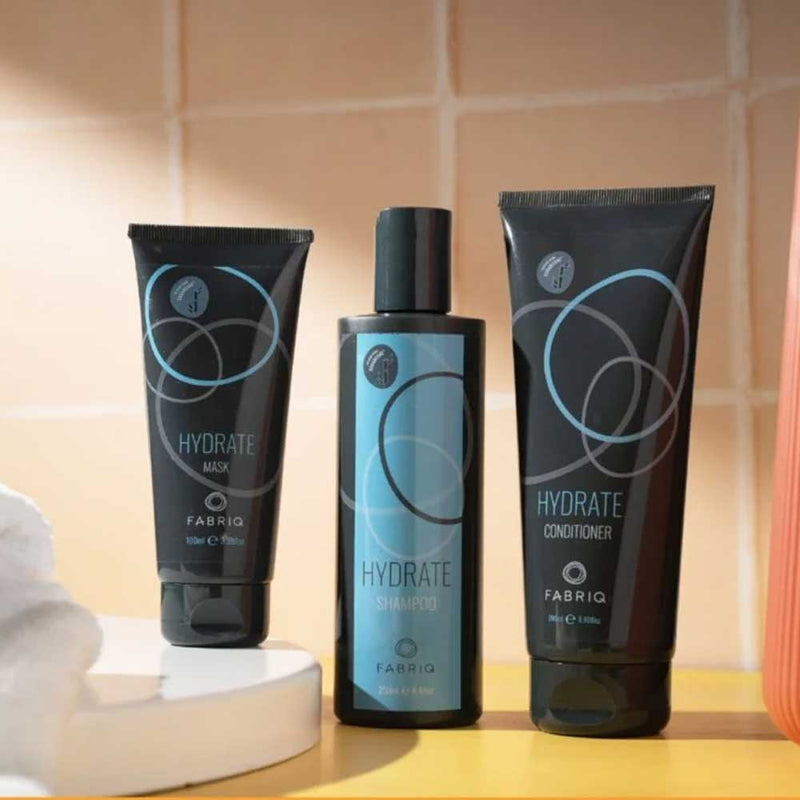 Fabriq Hydrate Trio – shampoo, conditioner and mask set for dry, damaged or textured hair. Restores moisture, strength and softness. Available at The DO Salon, St Kilda.