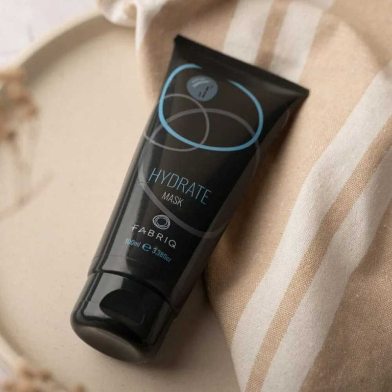 Deeply hydrate and nourish dry, frizz-prone hair with Fabriq Hydrate Mask 100ml. Infused with natural oils and proteins for silky, smooth, and shiny results. Available at The DO Salon, St Kilda.