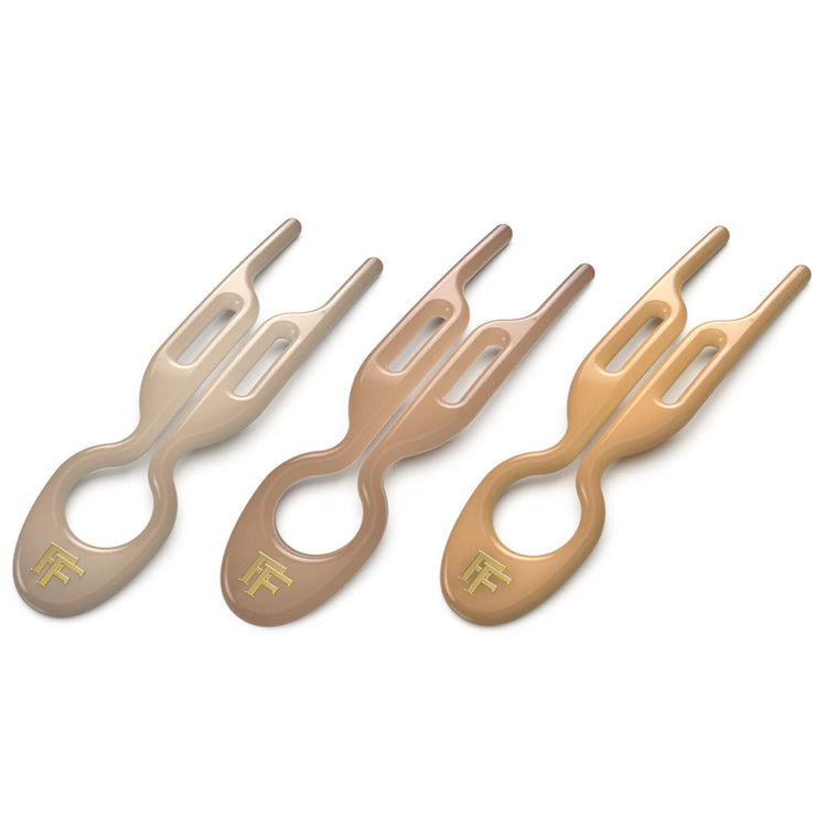Elevate your hairstyling with Fiona Franchimon's No.1 HAIRPIN Paris Collection - which includes Soft Beige, Satin Sand, and Smooth Caramel Nº1 Hairpins. Unique curved shape, strong lock, and ultimate flexibility, providing a grip five times stronger than regular bobby pins. Shop now for a touch of Parisian glamour.