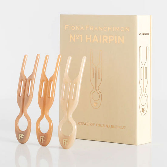 Elevate your hairstyling with Fiona Franchimon's No.1 HAIRPIN Paris Collection - which includes Soft Beige, Satin Sand, and Smooth Caramel Nº1 Hairpins. Unique curved shape, strong lock, and ultimate flexibility, providing a grip five times stronger than regular bobby pins. Shop now for a touch of Parisian glamour. Box