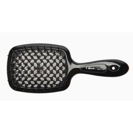 Revitalise your hair ritual with the Ibiza AirWave Shower Brush. Crafted in Italy, this versatile brush offers a scalp-friendly, tingly sensation, effortlessly gliding through any hair. Buy your AirWave Shower Brush at The DO Salon, St Kilda for an elevated haircare experience. 2