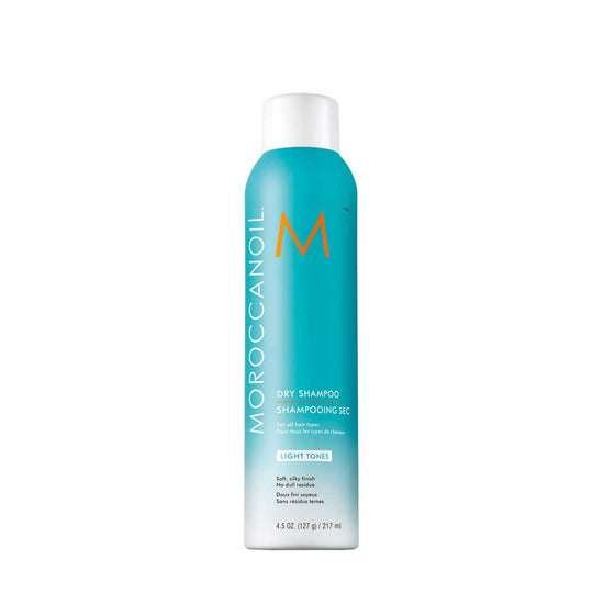 Keep blonde hair fresh and brass-free with Moroccanoil Dry Shampoo Light Tones (205ml). Cleanses, refreshes, and protects with UV defense and argan oil. Shop now at The DO Salon in St Kilda, Melbourne!