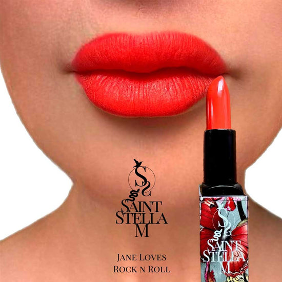 Make a statement with Saint Stella M Jane Loves Rock 'n' Roll Lipstick in coral orange—part of The Faces of Empowerment Collection. Smooth, long-lasting formula for vibrant, confident looks. Available at The DO Salon, St Kilda—shop online now! lifestyle