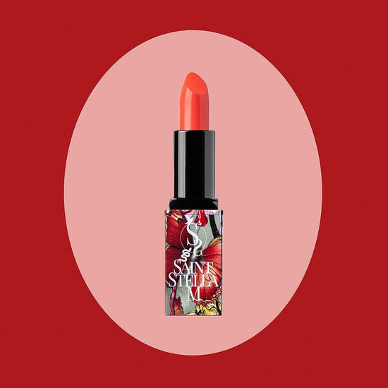 Make a statement with Saint Stella M Jane Loves Rock 'n' Roll Lipstick in coral orange—part of The Faces of Empowerment Collection. Smooth, long-lasting formula for vibrant, confident looks. Available at The DO Salon, St Kilda—shop online now! feature
